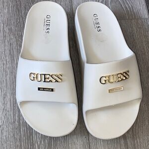 GUESS White Slide Sandals with Gold Logo Plaque